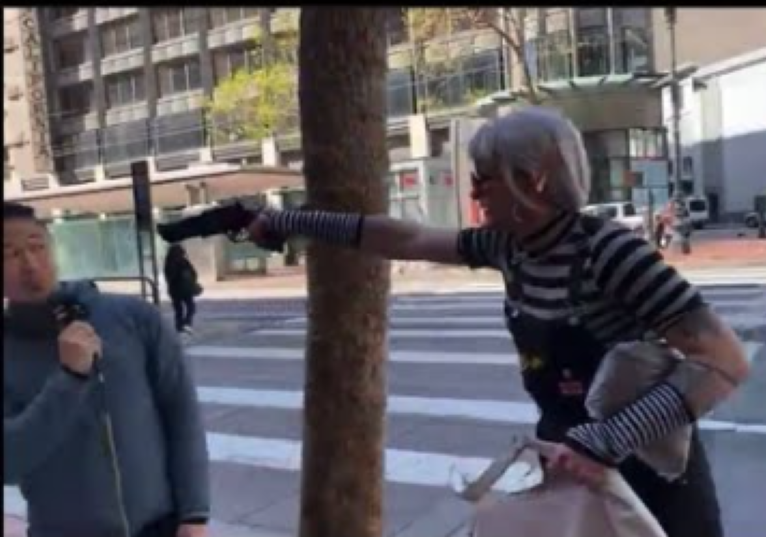 Transgender pulls gun out on street preacher March 2025